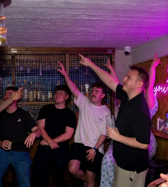 The crowd dancing at La Escuelita in the bar at The Old School Yard