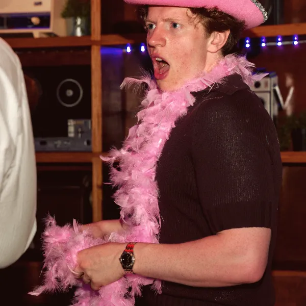 Pink hats and feather boas at La Escuelita