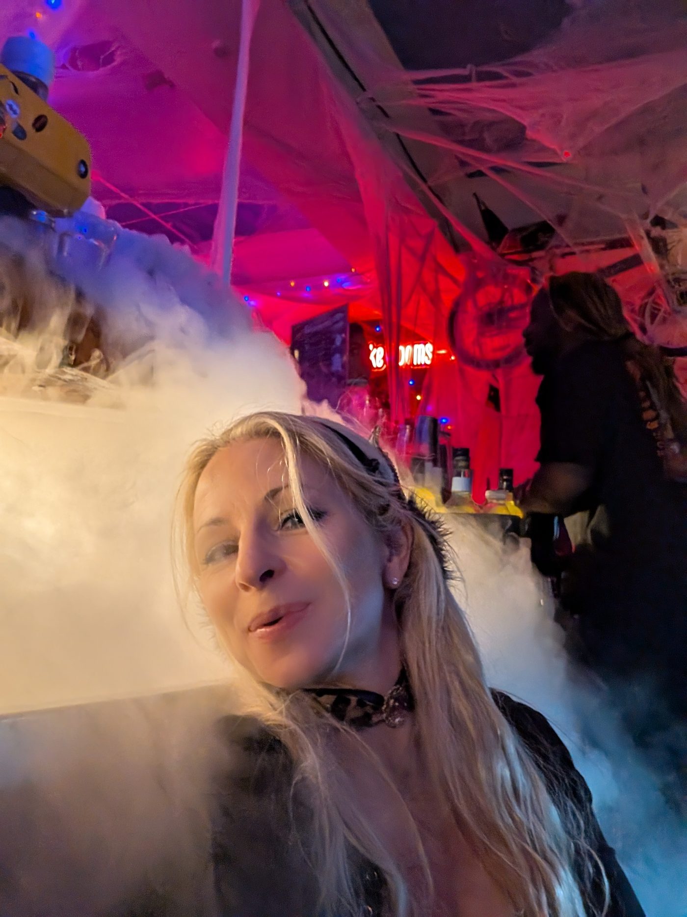 Fog and red light across the bar at School of Fright